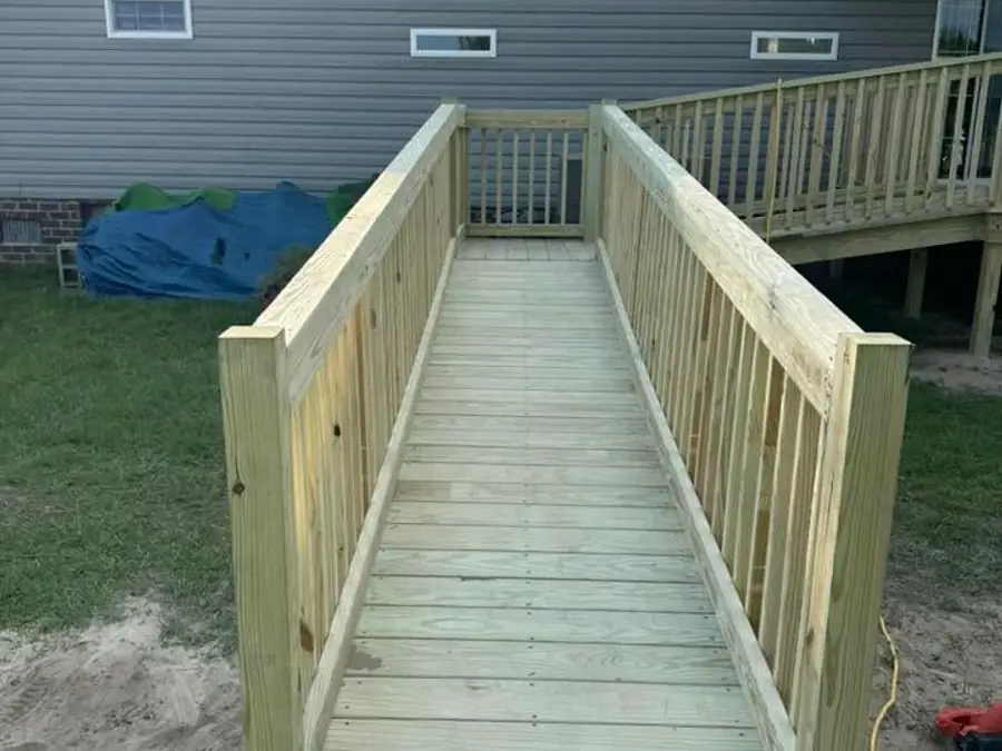 Custom porch and deck build by Lopez Brothers Roofing