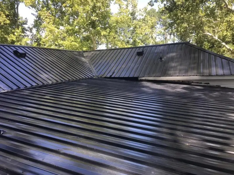 Finished standing-seam metal roof installed by Lopez Brothers Roofing in Wayne County, NC